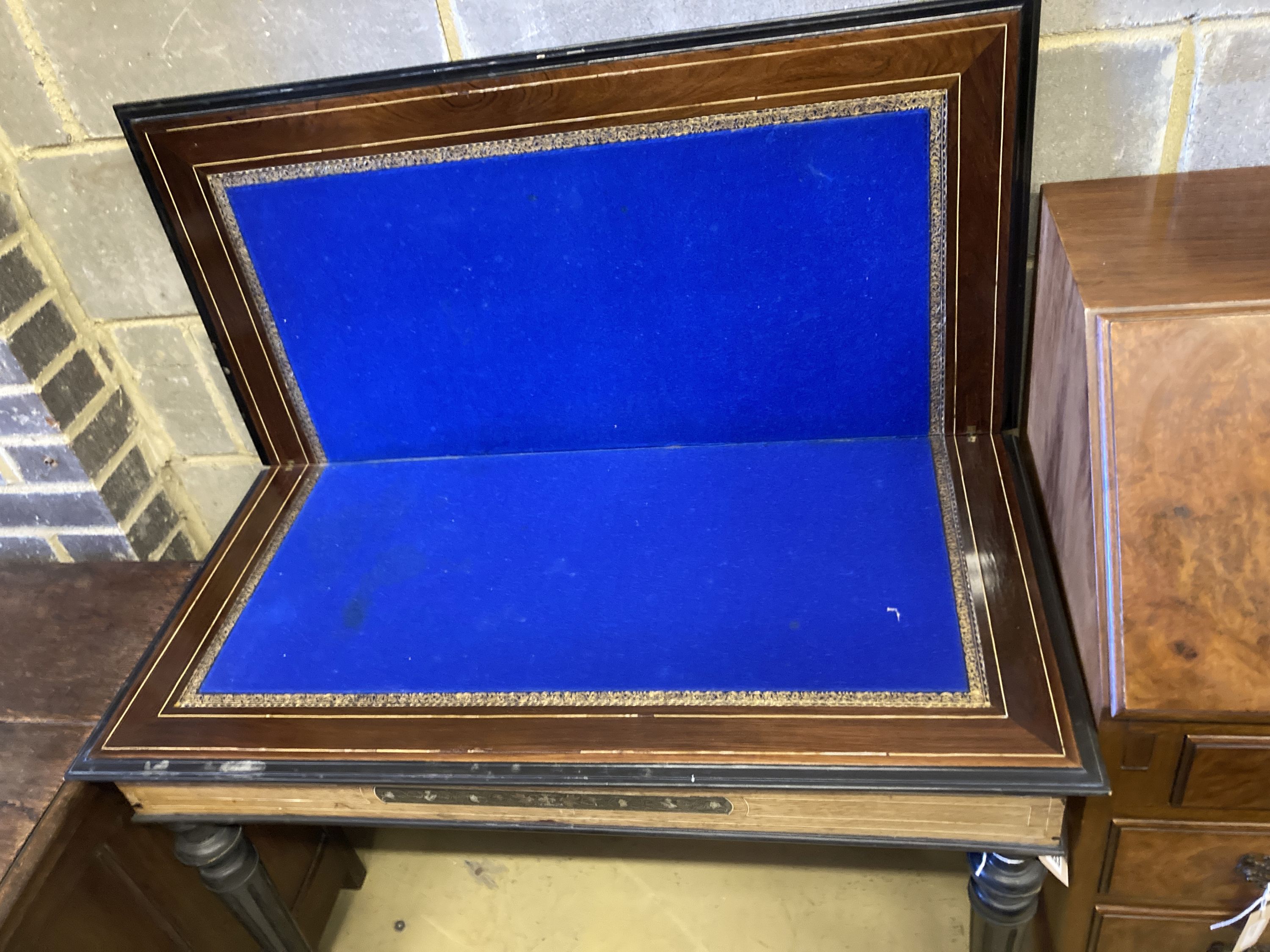 A 19th century Italian inlaid walnut and ebonised card table with folding top (faults), width 94cm, depth 47cm, height 75cm